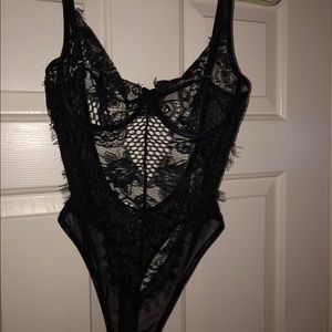 Black lace body suit